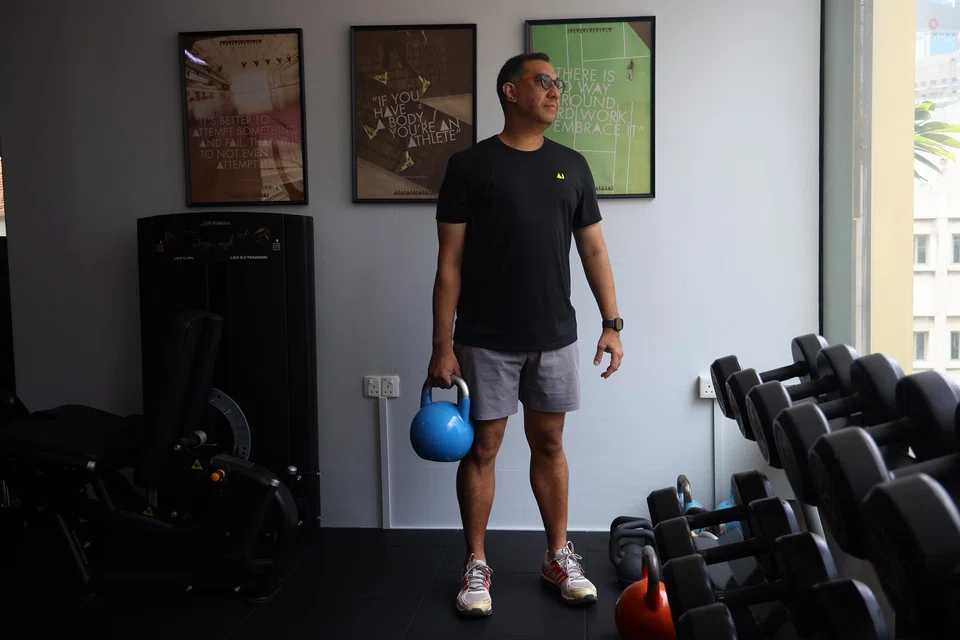 Former national bowler Carl de Vries, who had a kidney transplant in January 2024, at his gym in South Bridge Road on March 18.