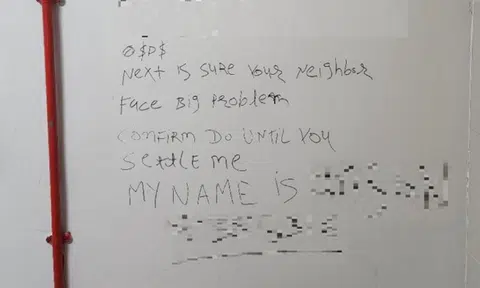 Police find graffiti that left a name behind in Sembawang, 2 men arrested for loan shark harassment