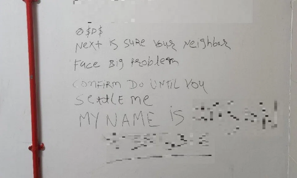 Police find graffiti that left a name behind in Sembawang, 2 men arrested for loan shark harassment