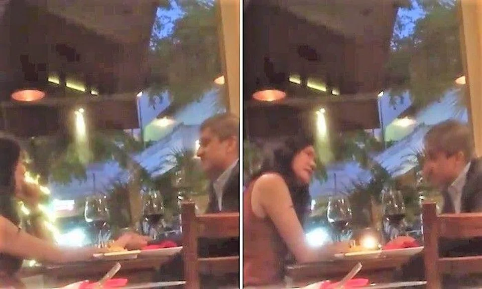 The 15-second video shows Mr Perera stroking the hand of a woman who seems to be Ms Seah, as the duo have a glass of wine at a restaurant.