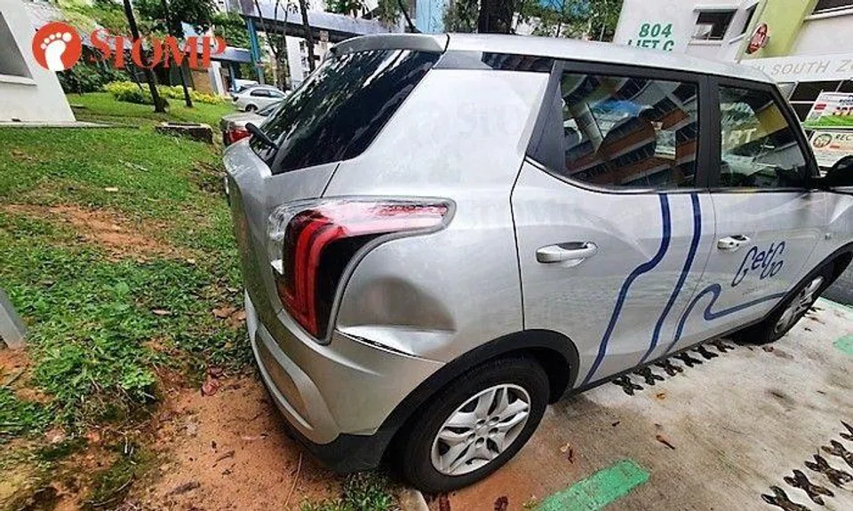 Stomper: "A motorcycle hit the right rear end of the rented car as I was merging into another lane."