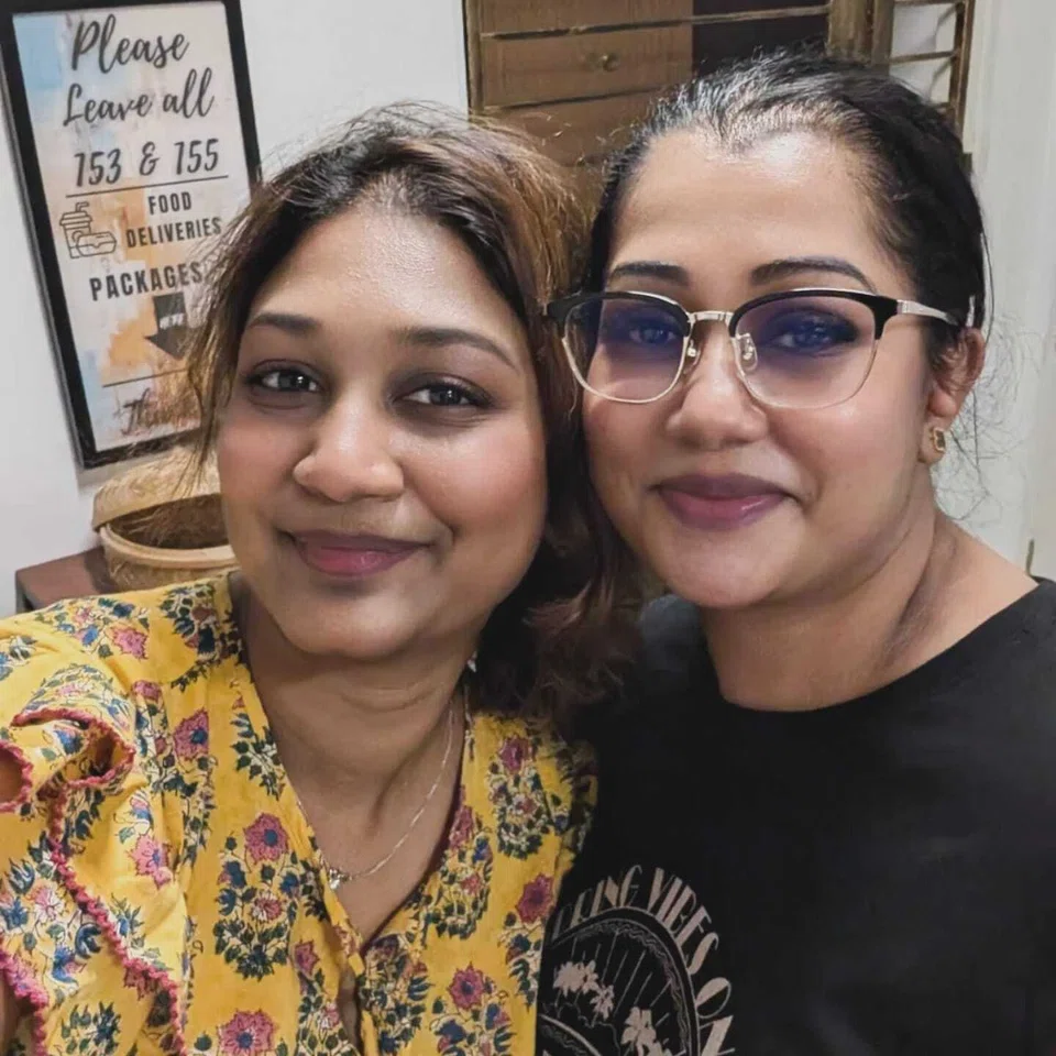 Ms Latashni Gobi Nathan (left) with her friend Sangeetha, who also helped deliver the baby.