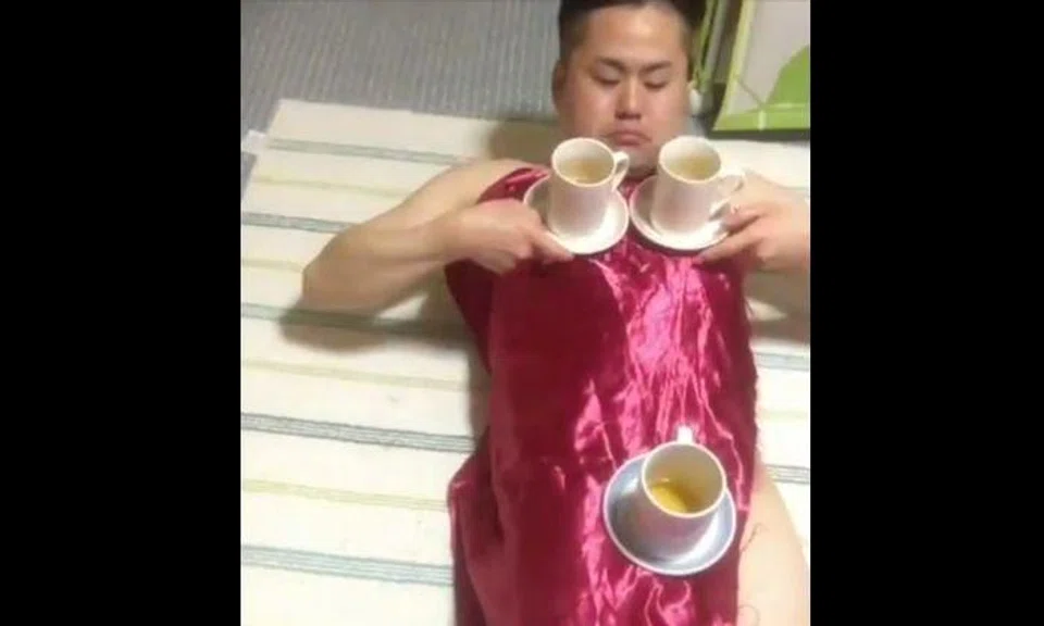 LOL! This guy takes tablecloth-pulling to new levels... or layers