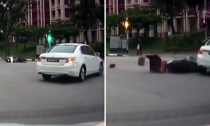 1 taken to hospital after motorcyclist collides with car at Woodlands ...