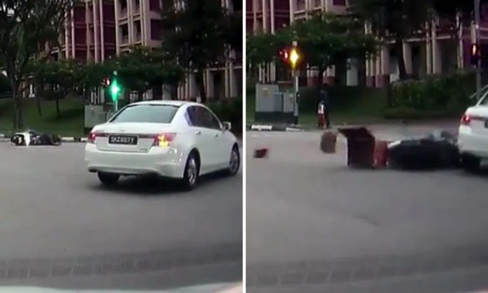 1 taken to hospital after motorcyclist collides with car at Woodlands ...