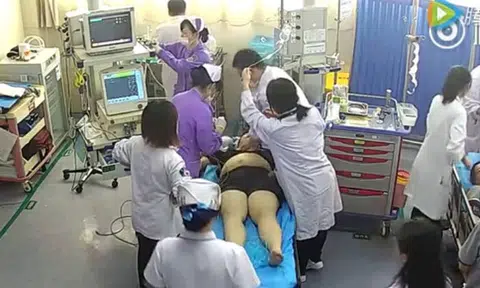 Father in China demands $300 from doctor for damaging son's clothes while saving his life