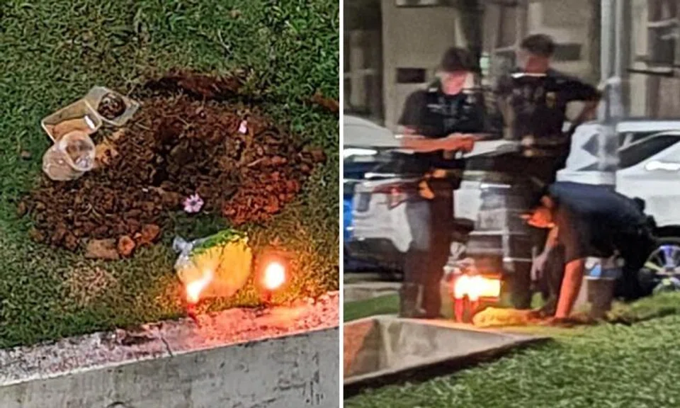 Someone digs hole to bury something in front of AMK block, police called