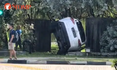 Lexus ends up on its side after accident at Bendemeer Road