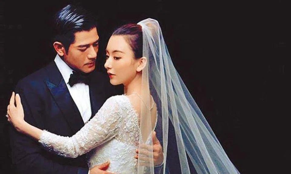 Clues that a baby might be on the way for newlyweds Aaron Kwok and Moka Fang