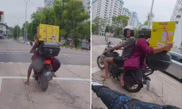 pillion rider sits backwards on motorcycle