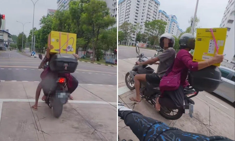 pillion rider sits backwards on motorcycle