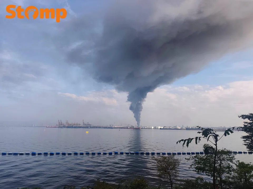 Massive plume of smoke from across the Strait of Johor