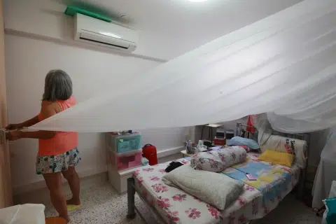 Bedok resident sets up makeshift tent in bedroom as water drips from ceiling
