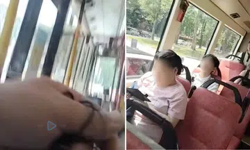 man gives out earphones to barebeating commuters on public buses