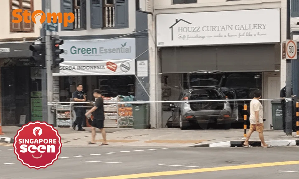 car crashes into geylang shop house after accident