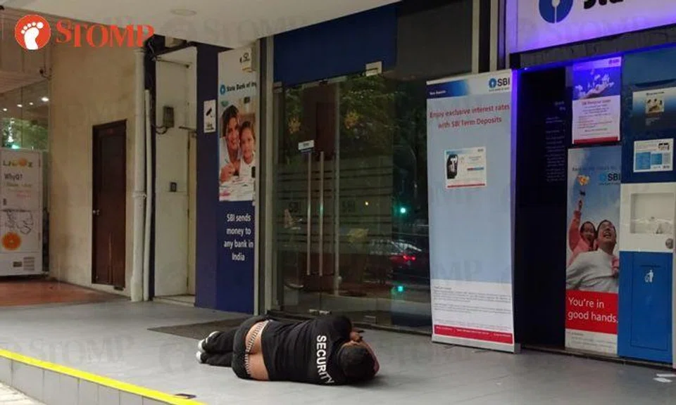 Man snoozes on ground at Little India in broad daylight -- with underwear exposed