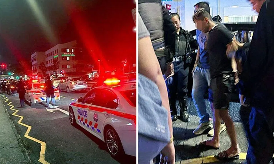 Traffic police officers detained and arrested the suspect for possession of an offensive weapon and traffic-related offences. PHOTOS: SHIN MIN DAILY NEWS READER