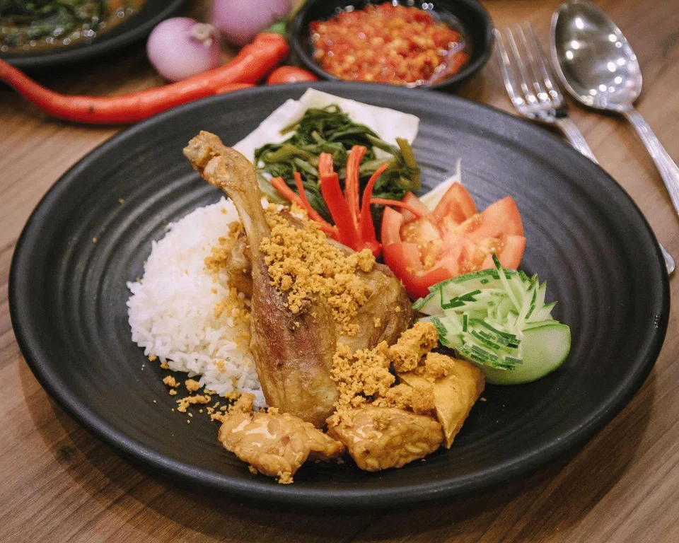 A signature dish at Indonesian restaurant Bebek Goreng Pak Ndut is Bebek Goreng Original, a dish of fried duck.