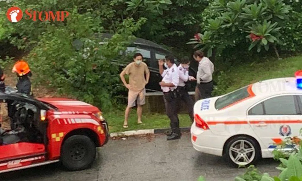 Car ends up in drain after accident near Commonwealth MRT station