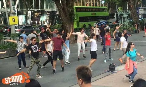'Random passersby' stage 'Orchard Road invasion' and spring surprise on unsuspecting onlookers