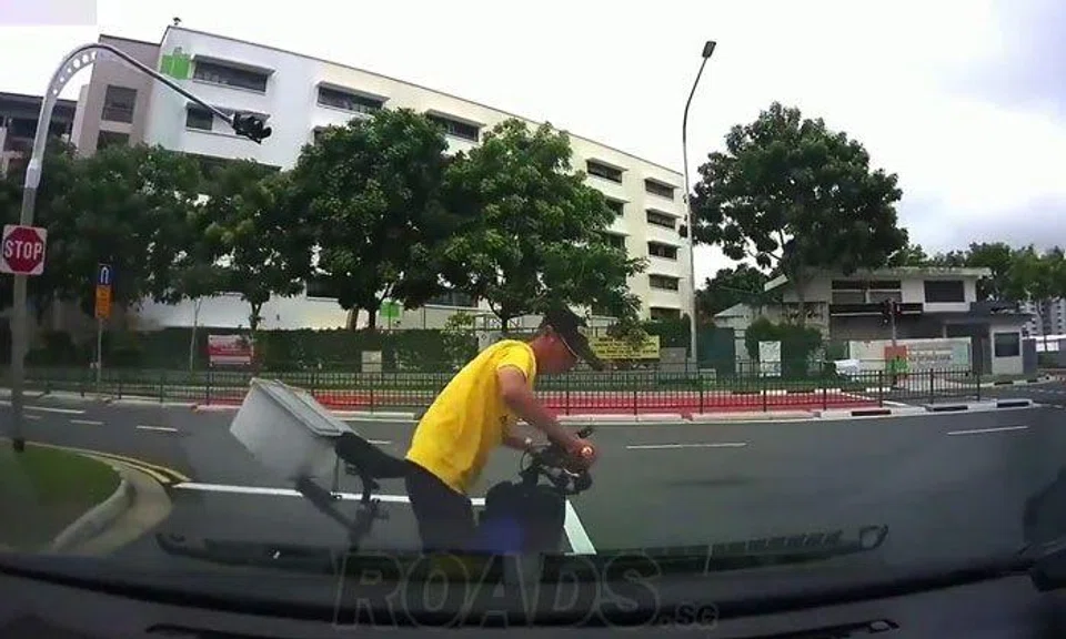 Driver stops just in time to avoid hitting e-scooter rider zipping across road