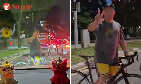 Cyclist hogs road, then poses for Stomper in Katong