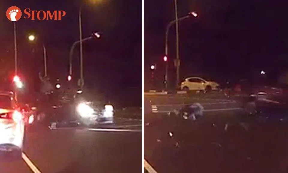 Motorcyclist sent flying after car beats red light and crashes into him at Bukit Batok