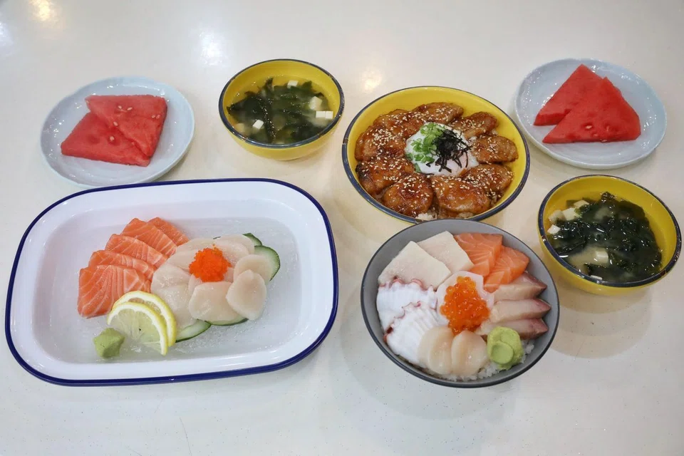 Pork Shogayaki Donburi, 6 Kind Sashimi Donburi, and salmon and hotate sashimi at Ten Ten Otoko.