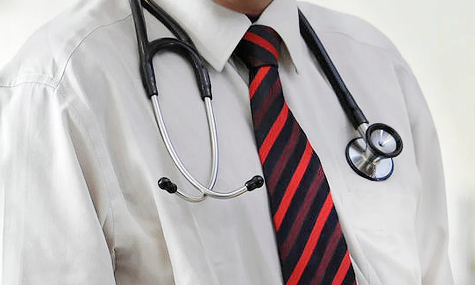 Doctor at Khoo Teck Puat Hospital charged over molest claims