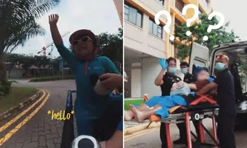 girl bicycle waves to scdf paramedics