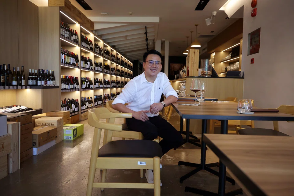Mr Lee Joon Peng says opening That Wine Place was a blend of two passions - his wife's nostalgic fondness for Holland Village and his own love affair with wine bars.