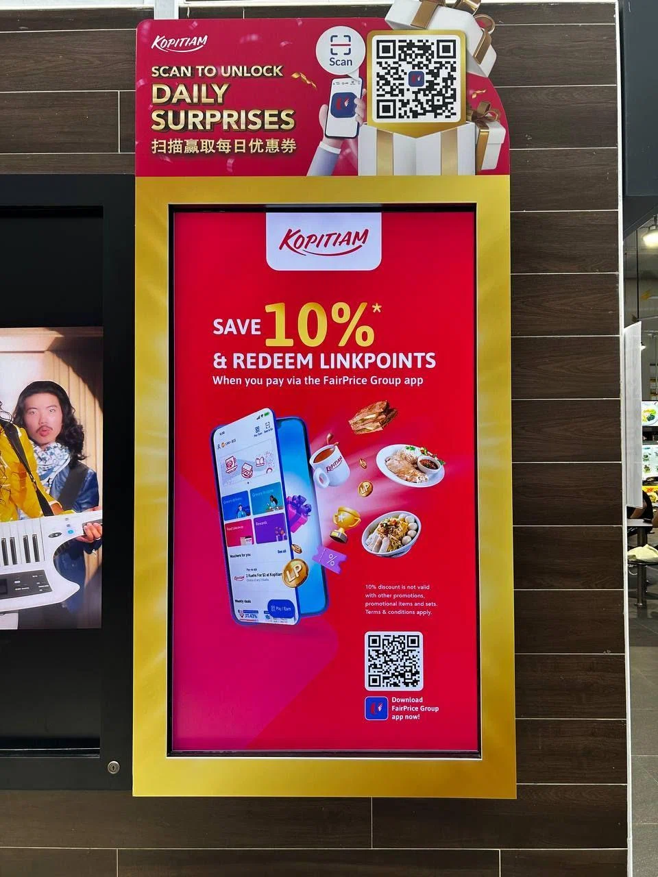 Discounts offered through FairPrice Group app on display at Anchorvale Village Hawker Centre.