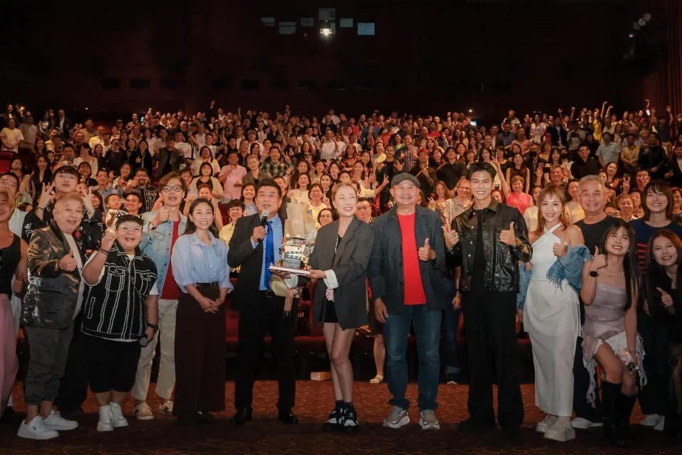 Singaporean director Jack Neo with his collaborators and guests at the event honouring his 50-year contribution to Singapore's entertainment landscape as an actor, writer, director and producer. ST PHOTO: GAVIN FOO