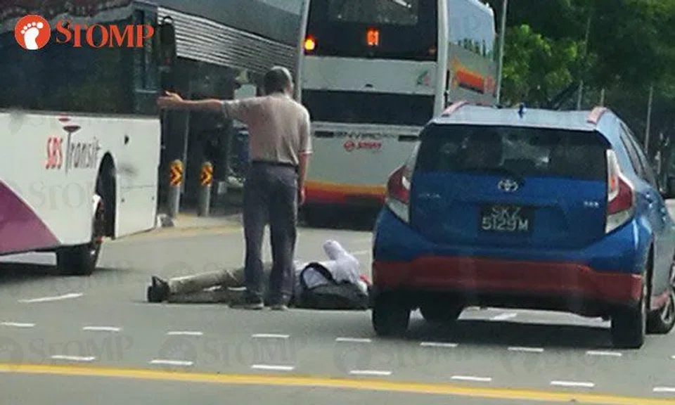 Man, 50, lies on road after being hit by car at traffic junction in Kallang