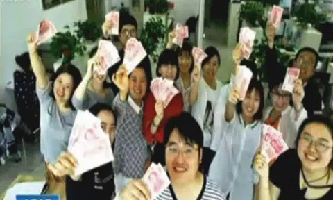 Chinese company offers staff $20 for every kilogram they lose