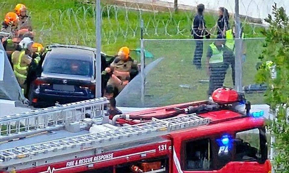 Police said they were alerted at about 5.55pm on Jan 27 to an accident involving a car that was believed to have skidded at 6 Lempeng Drive. PHOTO: SHIN MIN DAILY NEWS