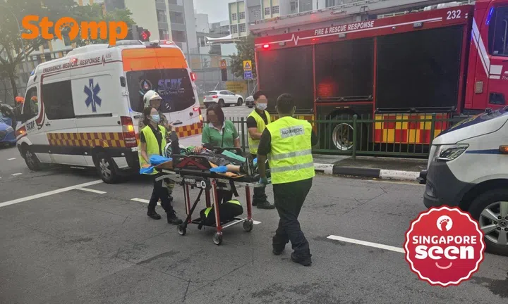Person carried away by SCDF on stretcher