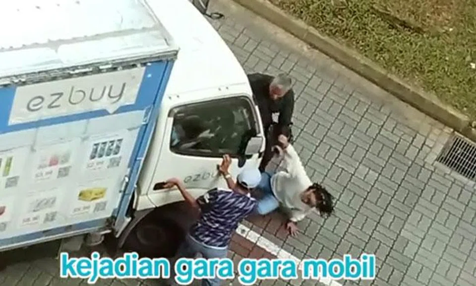 Driver arrested after woman nearly gets crushed underneath ezbuy lorry in Punggol dispute