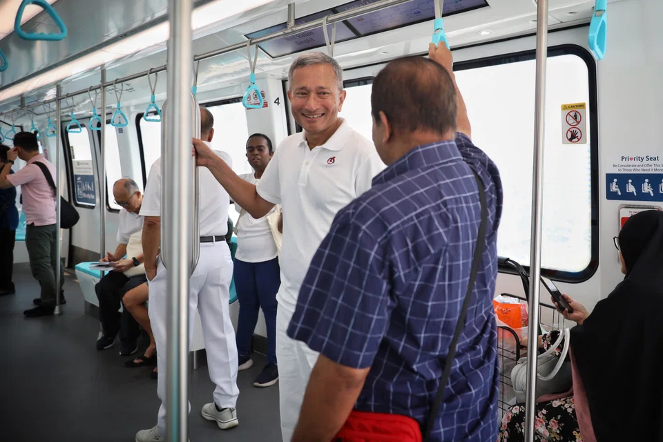 Foreign Minister Vivian Balakrishnan on the LRT from Bukit Panjang to Bangkit to get to the Al-Iman mosque on April 25.