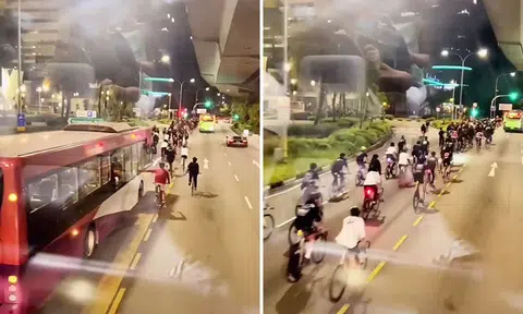 Huge group of cyclists hog lane, dangerously overtake bus along Telok Blangah Road