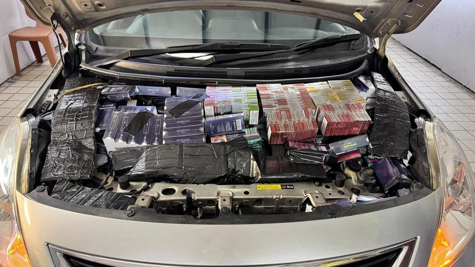 More than 5,900 units of e-vaporisers and related components were hidden in various compartments of the car.