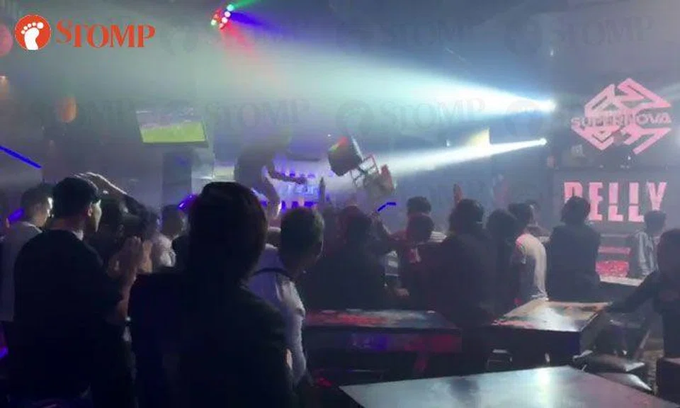 Clarke Quay club riot: 2 men arrested