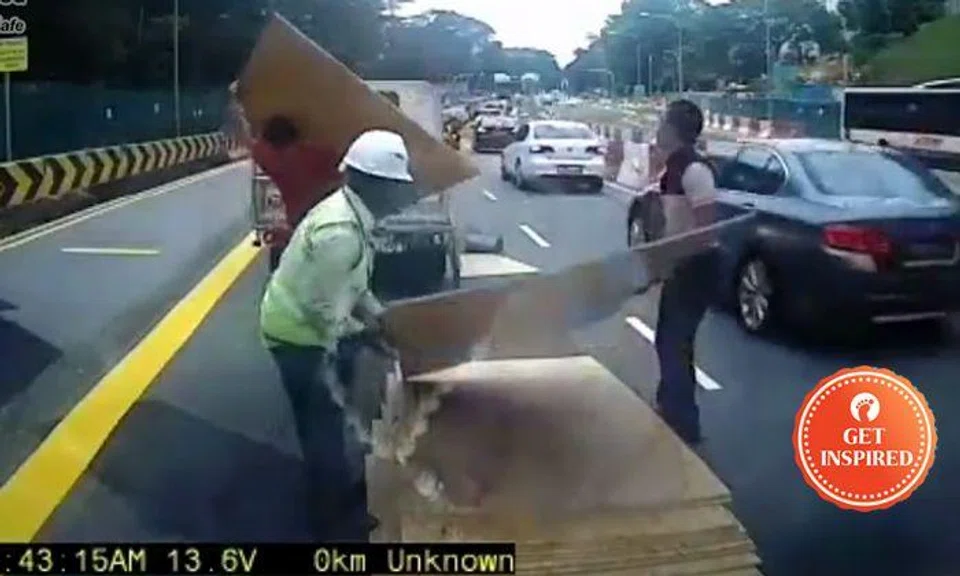 Kudos to these selfless guys for helping driver with load that fell off truck