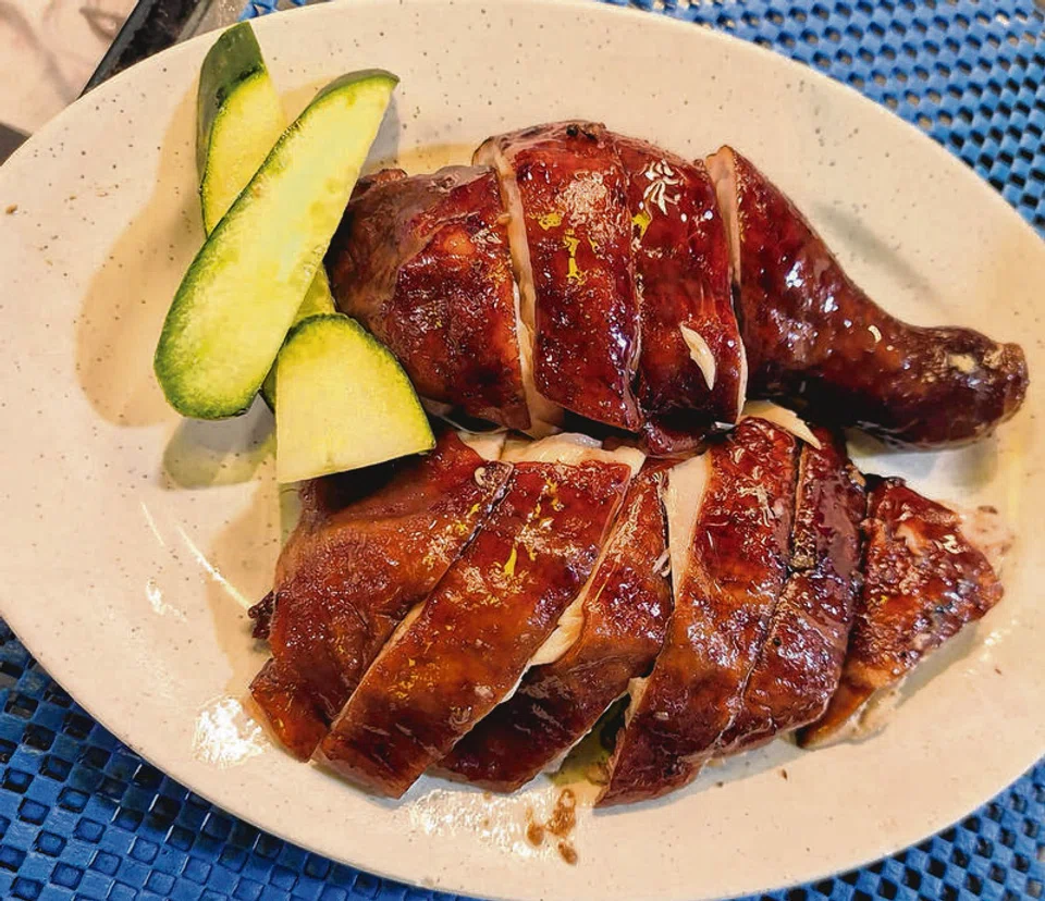 Woman says $8 chicken portion shrank by a third, Queenstown hawker denies shortchanging her