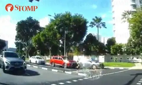 Woman in Mercedes drives against traffic along Tanjong Katong Road