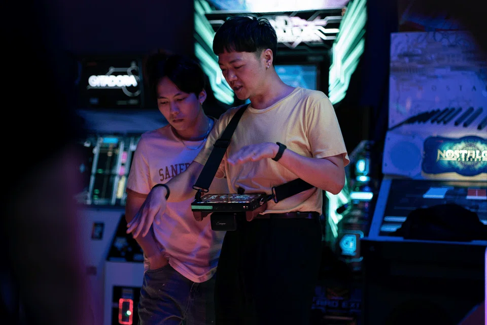 Singaporean writer-director Yeo Siew Hua (right) and Taiwanese actor Wu Chien-ho on the set of Stranger Eyes in Taiwan.