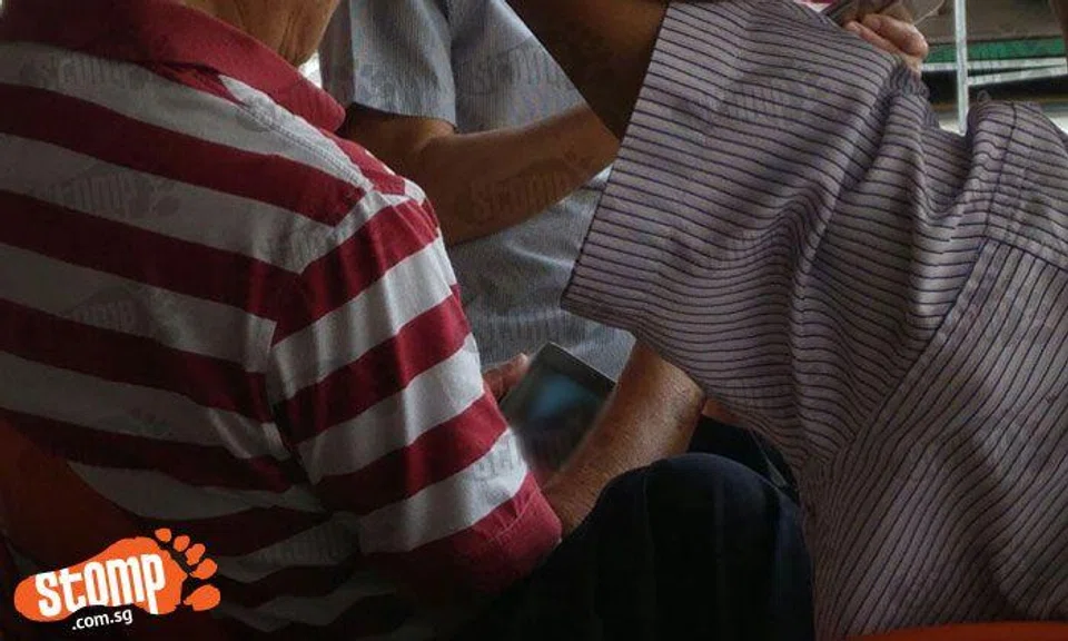 Uncle openly watches porn at Tampines coffeeshop -- and his pals happily join in