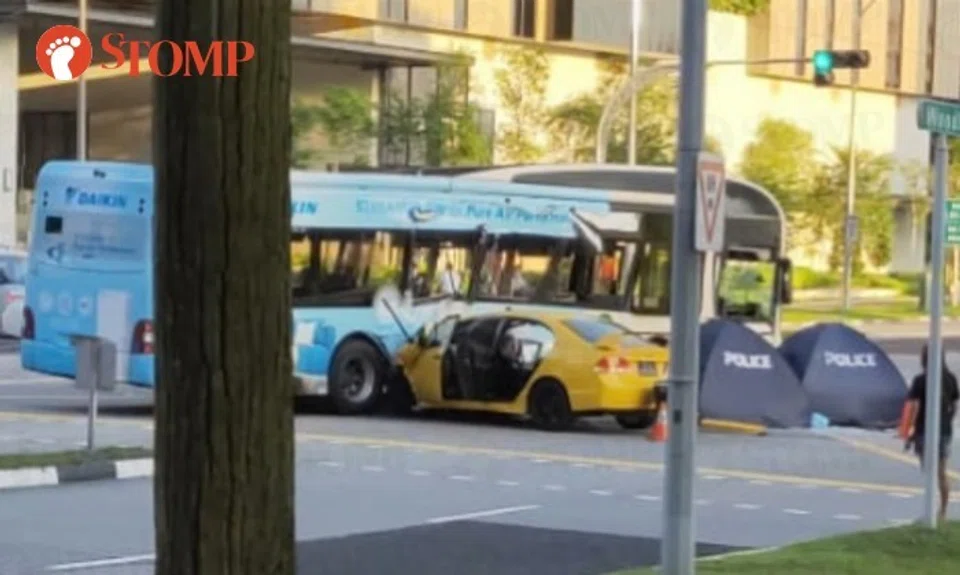 The yellow car was driving along Woodlands Avenue 9 when it crashed into the side of the bus making a right turn at the junction.