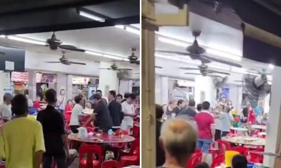 A video circulating online appears to show one man being held back by others to prevent from him attacking someone else.