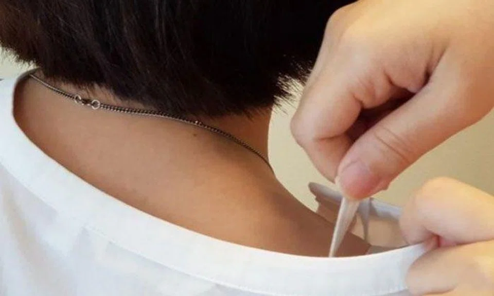 Nanyang Girls' High apologises after teacher pulls on students' bra straps during uniform inspection